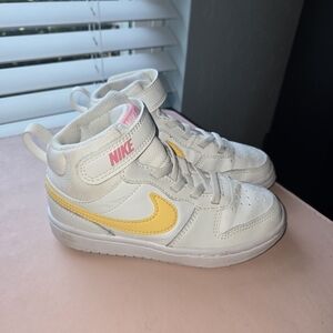 Nike Kids White Sneakers with Yellow Swoosh